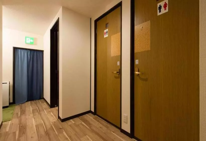 ペンション Guest House Suzumeno Kakurembo