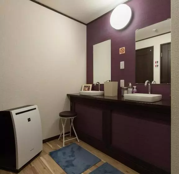 ペンション Guest House Suzumeno Kakurembo