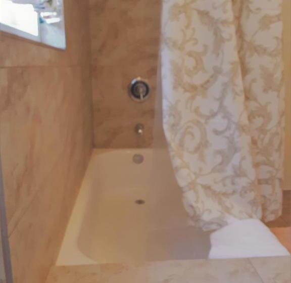 酒店 Secret Garden Inn & Cottages