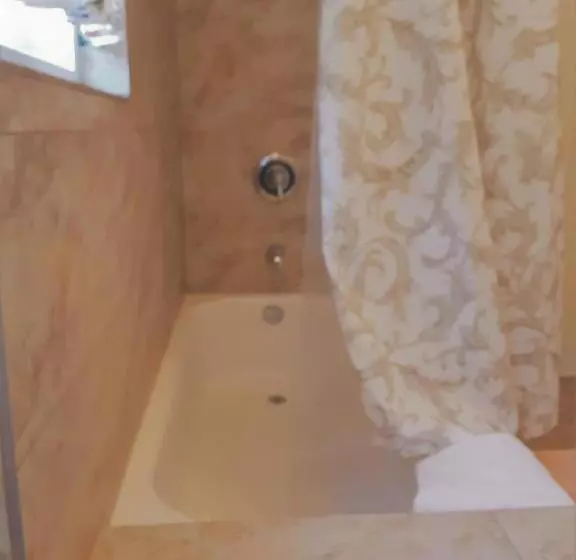 فندق Secret Garden Inn & Cottages