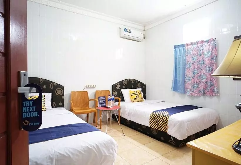 Hotelli Spot On 1854 Sepinggan Asri Syariah Guesthouse
