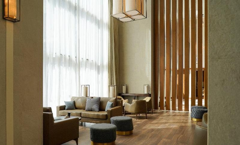 Отель Staybridge Suites Dubai Al Maktoum Airport, An Ihg