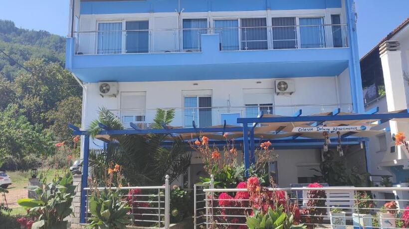 Отель Celeste Deluxe Apartments