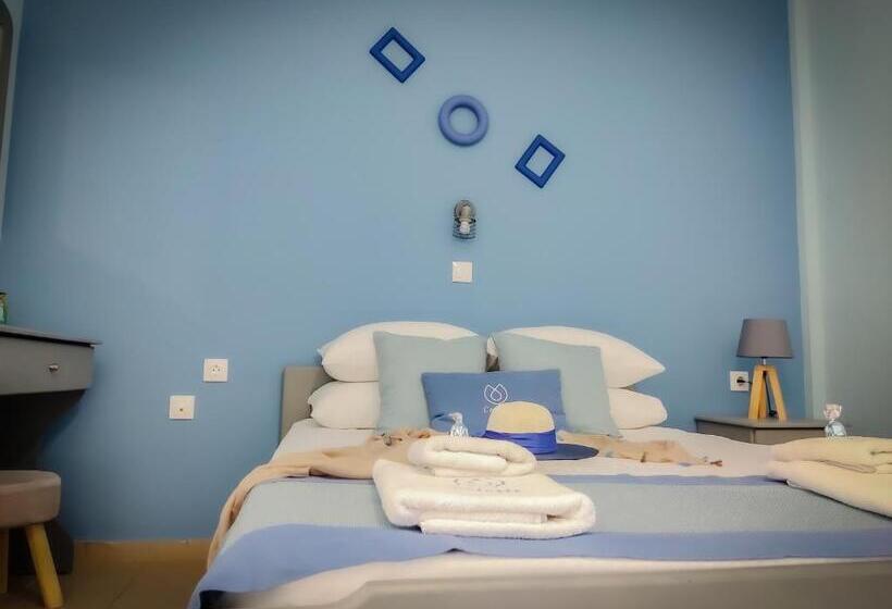 Отель Celeste Deluxe Apartments