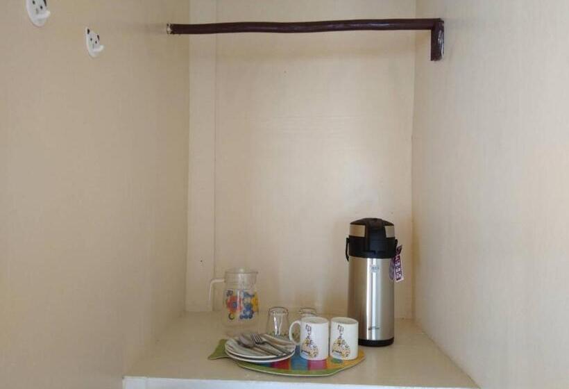 Pension (Hôtel basse catégorie) Nelmann's Nipa Huts