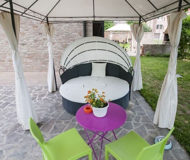 تختخواب و صبحانه R&b Un Mondo A Colori