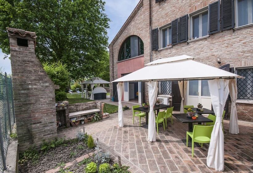 تختخواب و صبحانه R&b Un Mondo A Colori