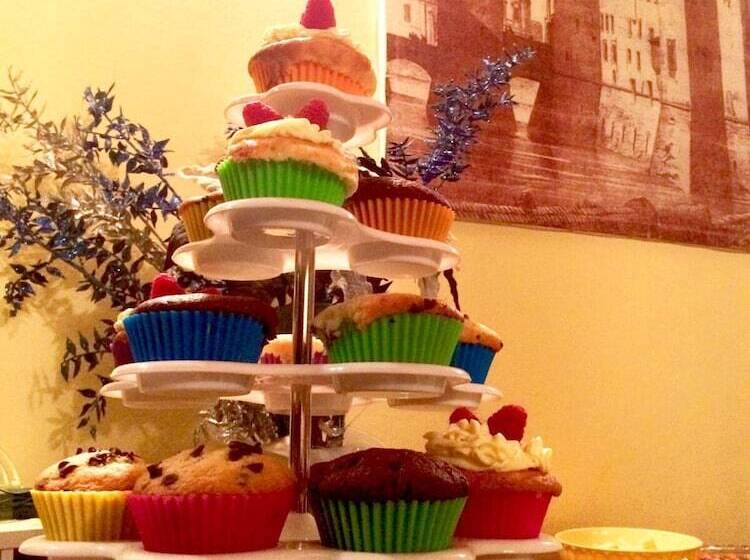 تختخواب و صبحانه R&b Un Mondo A Colori