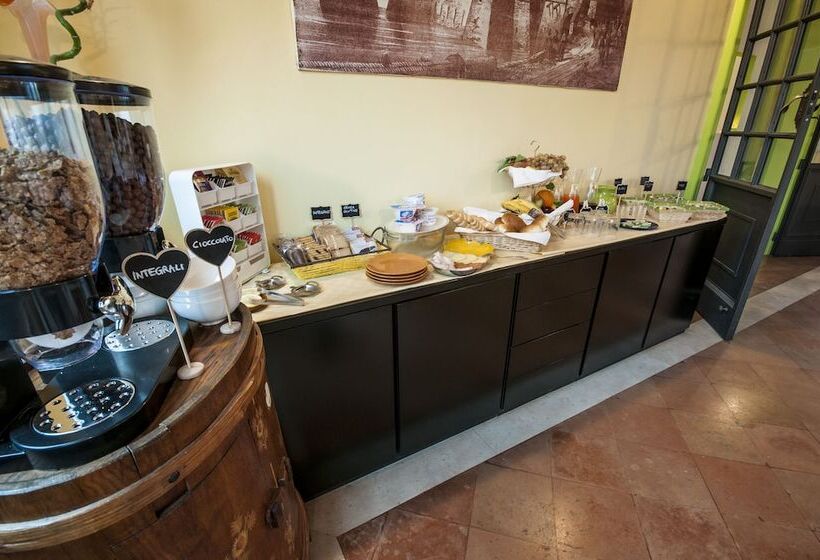 تختخواب و صبحانه R&b Un Mondo A Colori