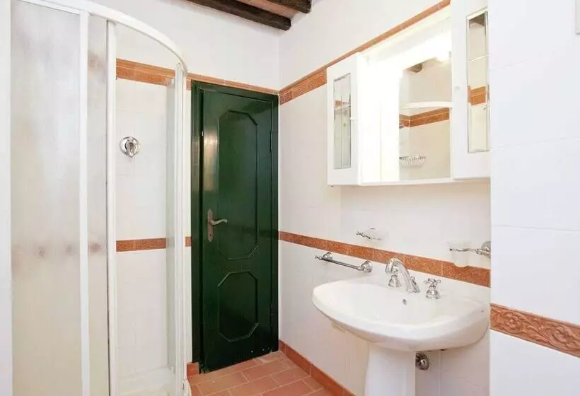 A Rustic House Set In The Tuscan Landscape