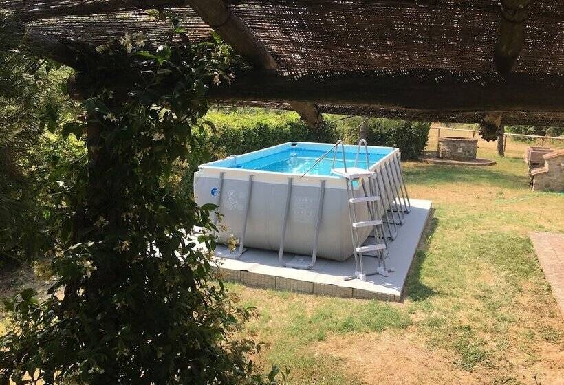 A Rustic House Set In The Tuscan Landscape