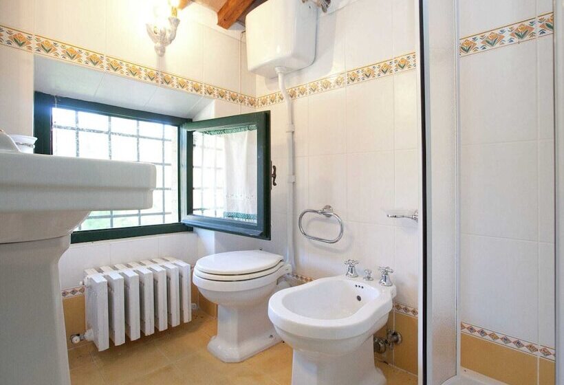 A Rustic House Set In The Tuscan Landscape