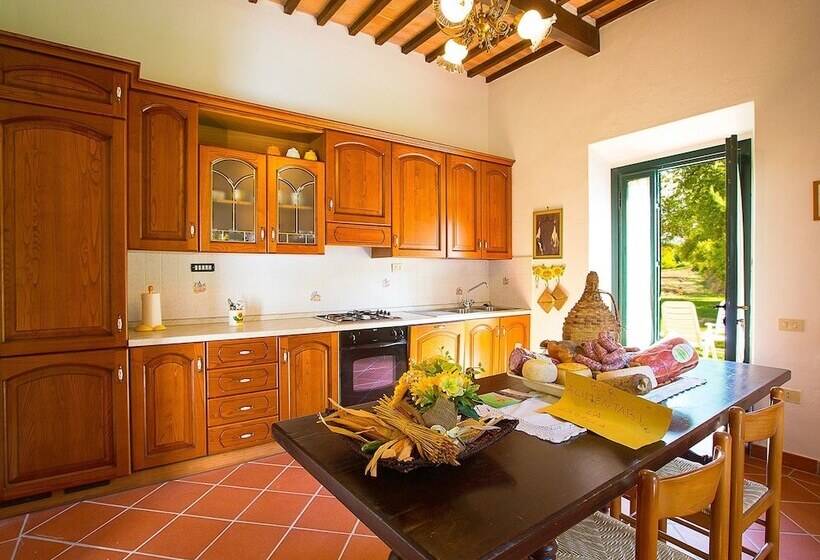 A Rustic House Set In The Tuscan Landscape