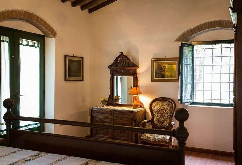 A Rustic House Set In The Tuscan Landscape