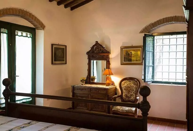 A Rustic House Set In The Tuscan Landscape