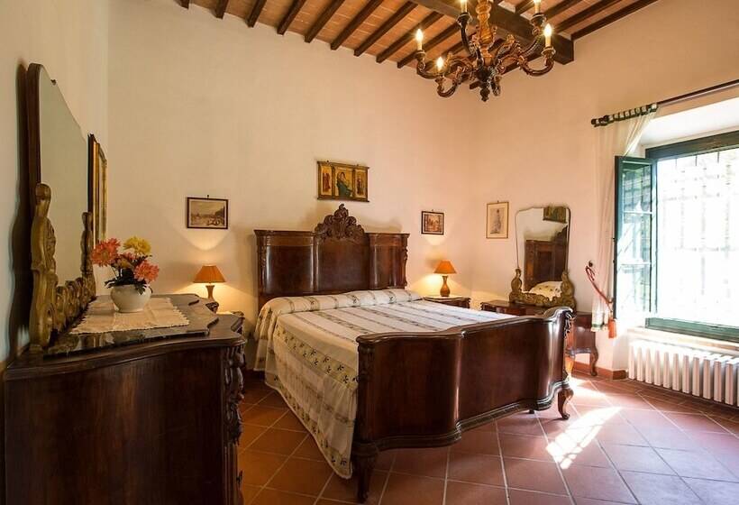 A Rustic House Set In The Tuscan Landscape