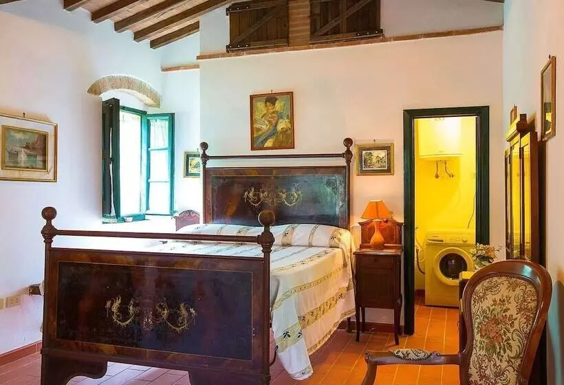 A Rustic House Set In The Tuscan Landscape