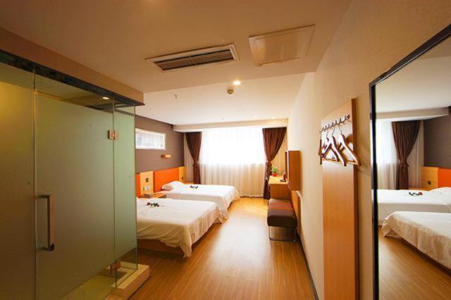 Hotel 7days Premium Jingjiang Fuhai New World Bus Station