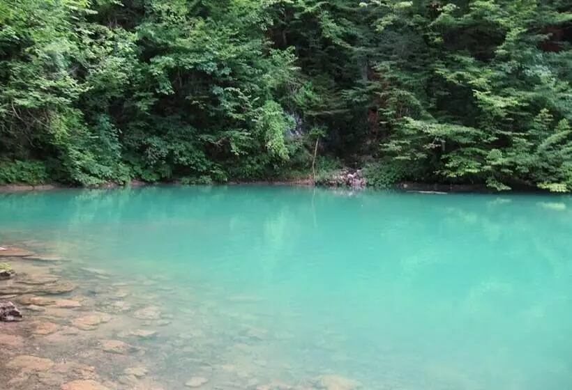 Traditional Wooden House By The River
