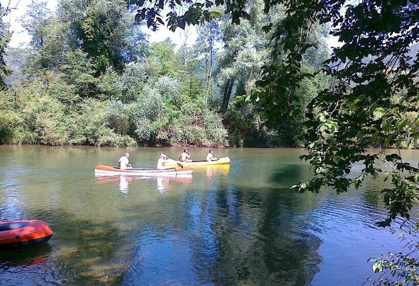 Traditional Wooden House By The River