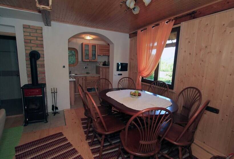 Traditional Wooden House By The River