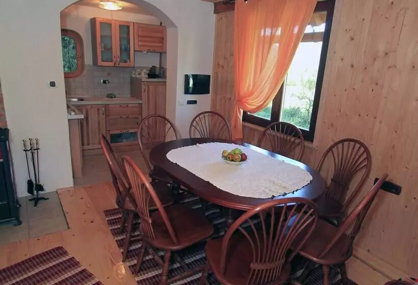 Traditional Wooden House By The River