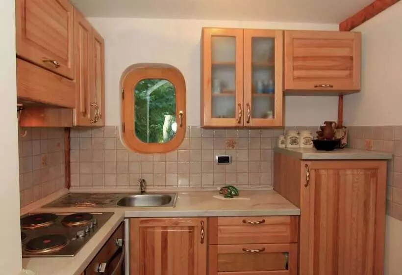 Traditional Wooden House By The River