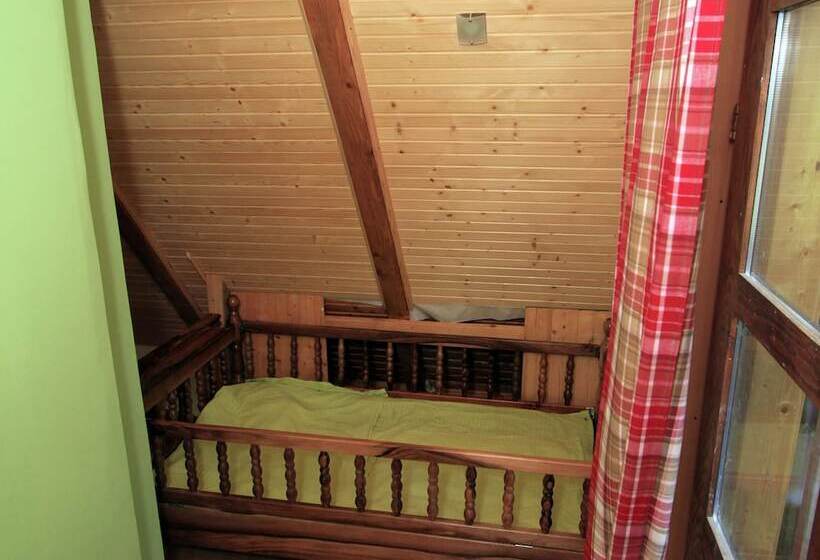 Traditional Wooden House By The River