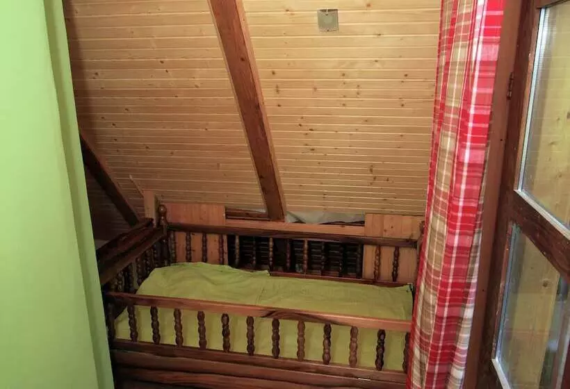 Traditional Wooden House By The River