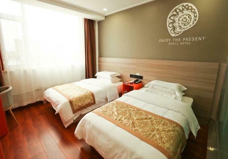 Отель Shell Yizhou Yifu District Railway Station