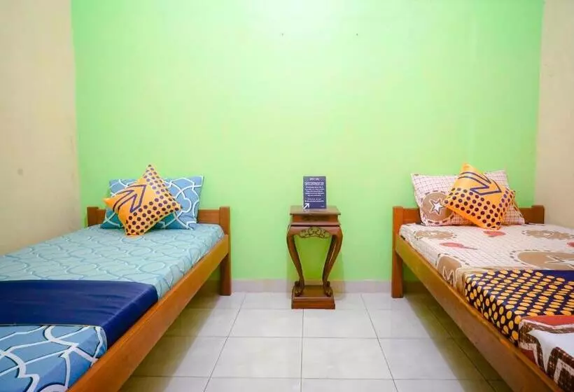 ホテル Spot On 2440 Wallet Family Residence Syariah