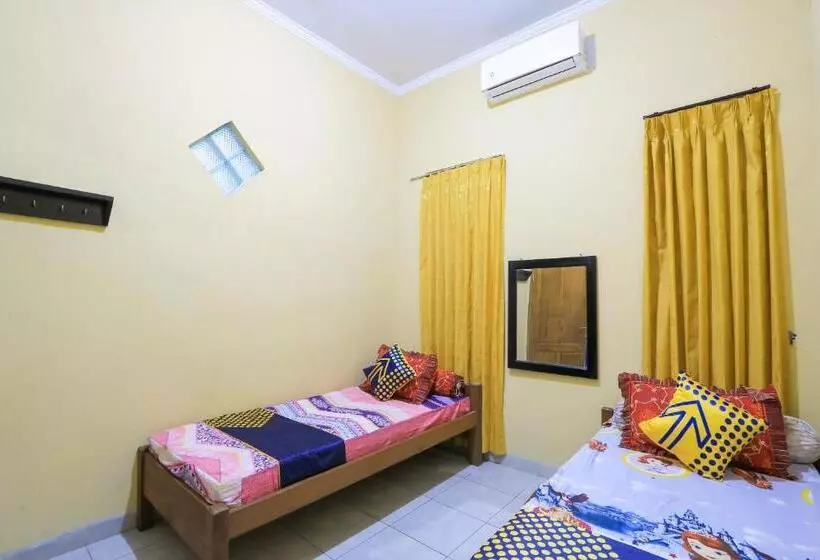 ホテル Spot On 2440 Wallet Family Residence Syariah