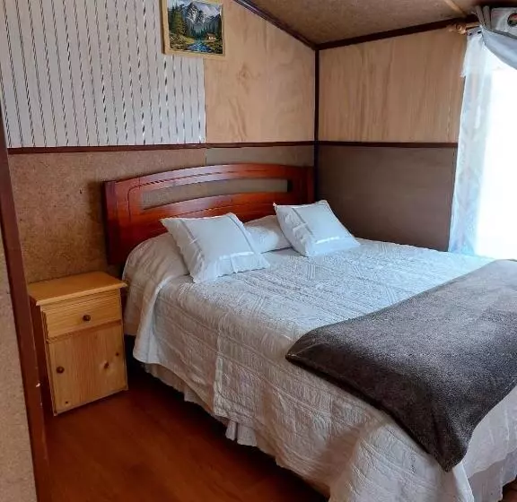 ペンション Hostal Y Cabañas Ventisquero