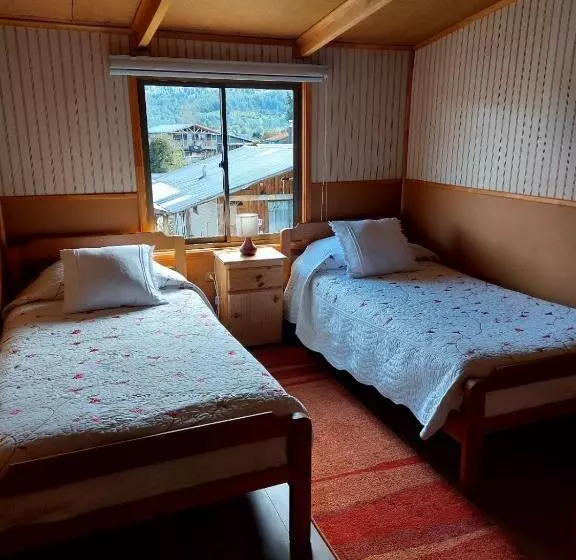 ペンション Hostal Y Cabañas Ventisquero