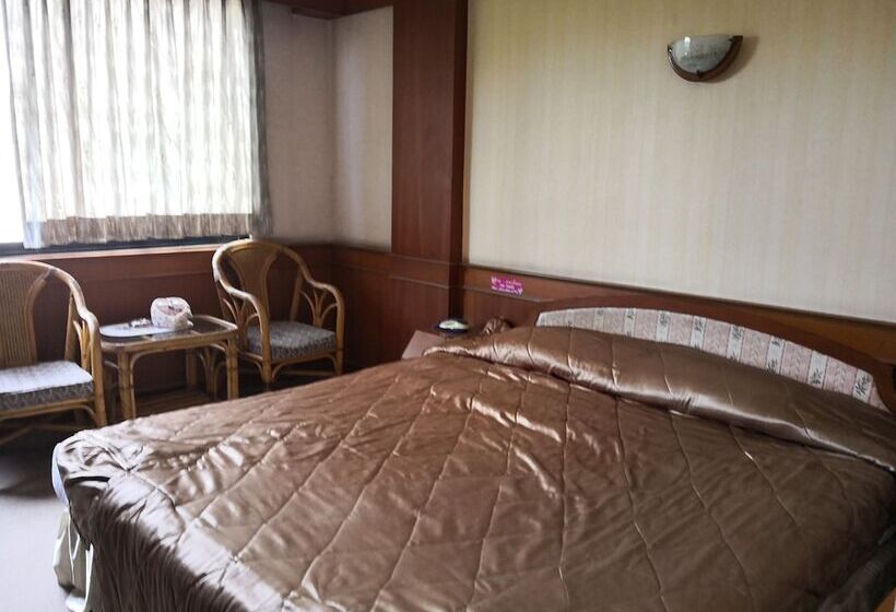 호텔 Cl Garden Inn