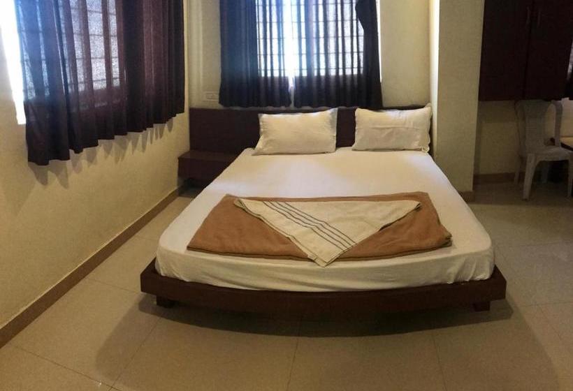 Отель Staymaker Bright Palace Residency