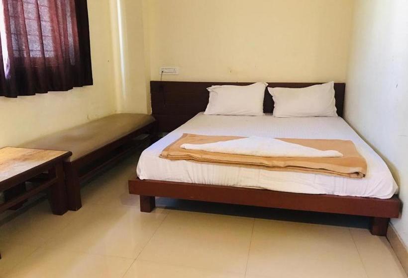 Отель Staymaker Bright Palace Residency