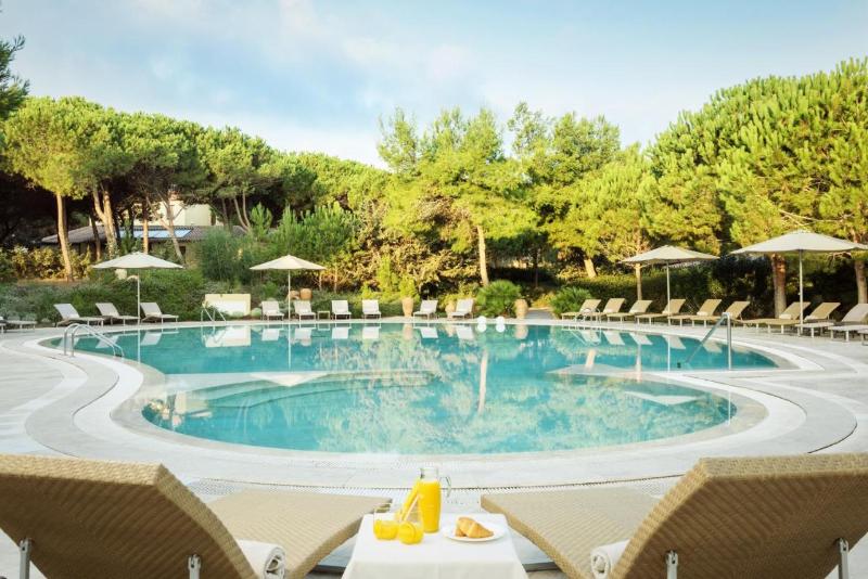 Отель Is Arenas Resort