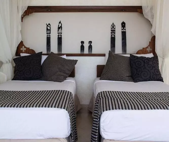 בית מלון כפרי Karafuu Beach Resort & Spa