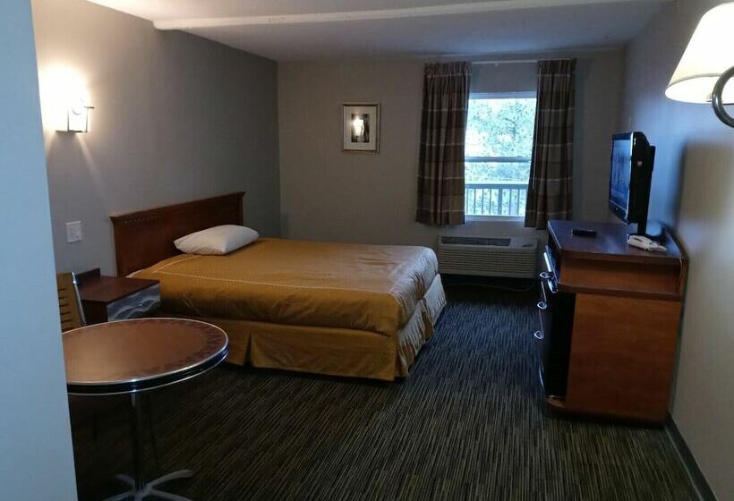 Отель Peachtree Inn & Suites