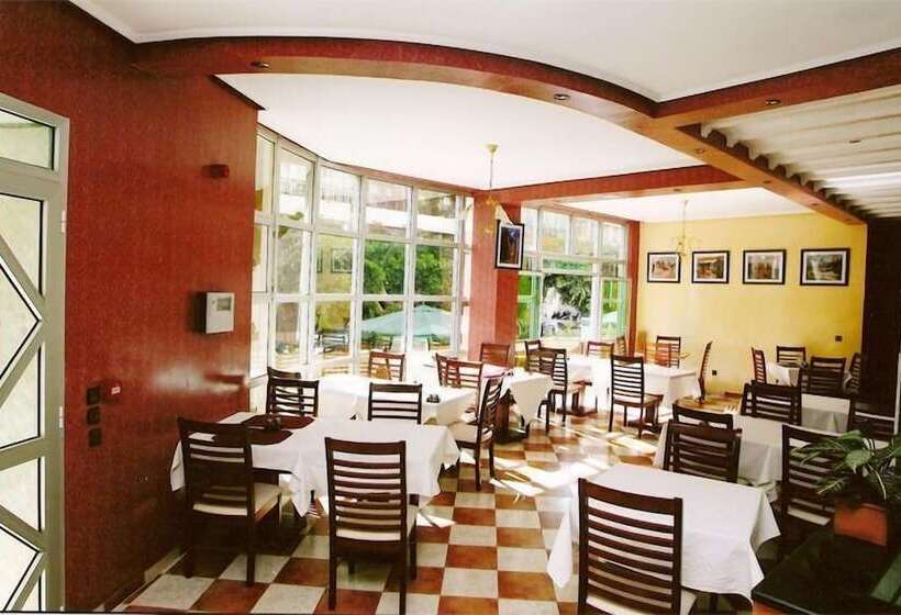 Отель East West