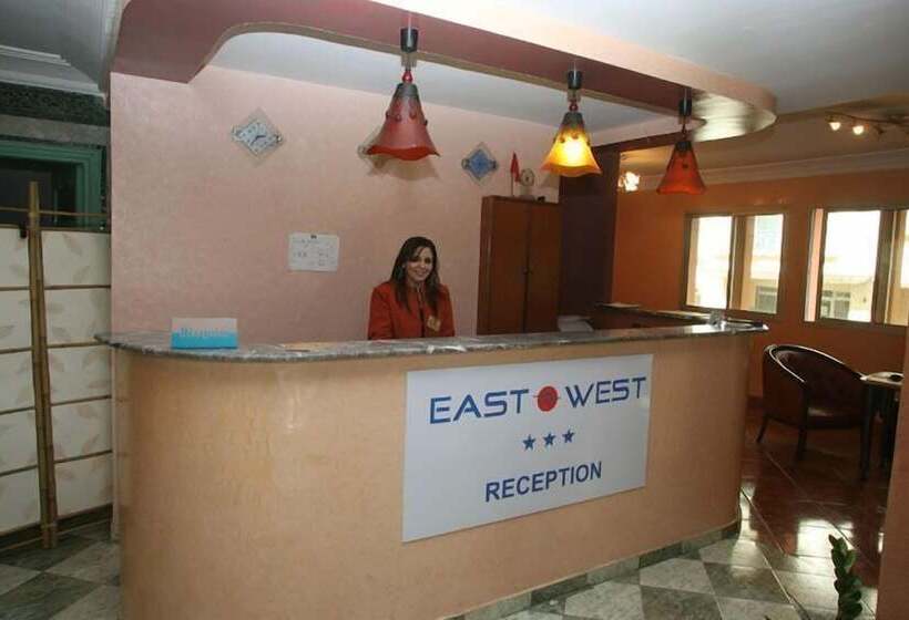 Отель East West