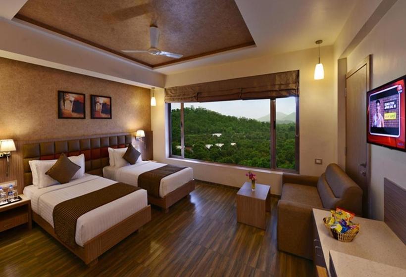 אתר נופש Sarovar Portico Sasangir