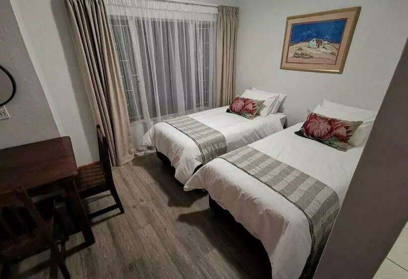 ペンション Rooihuis Lodge