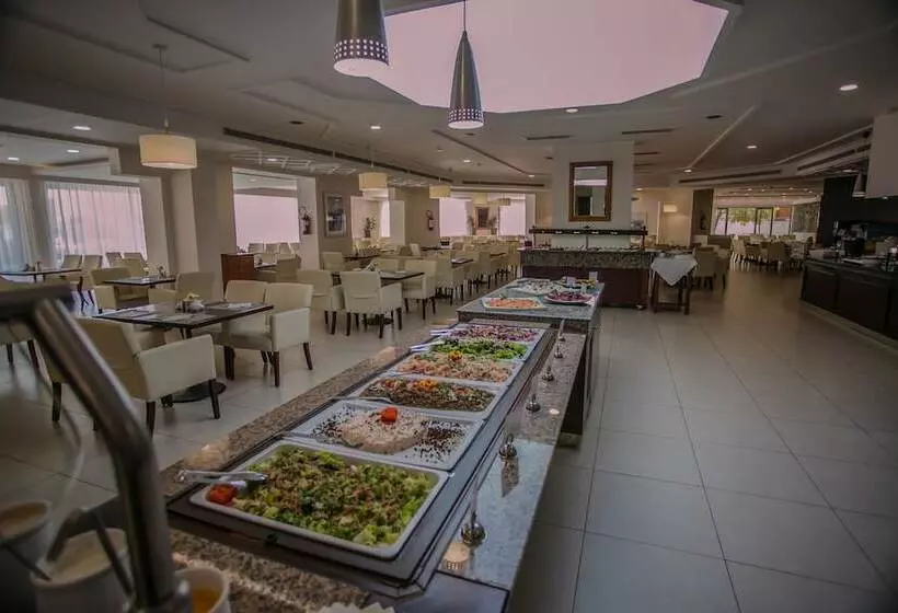 Giannoulis – Almyra Hotel & Village