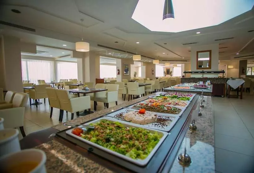 Giannoulis – Almyra Hotel & Village