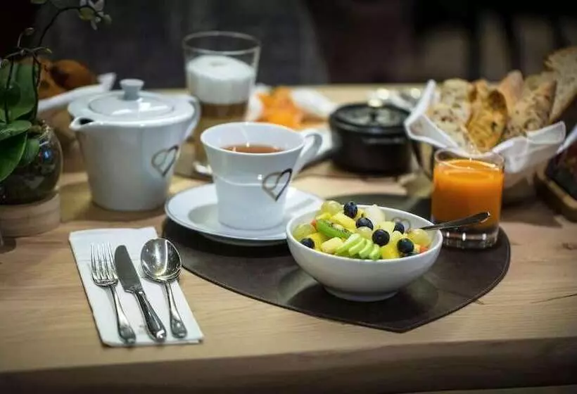 Отель Au Coeur Du Village