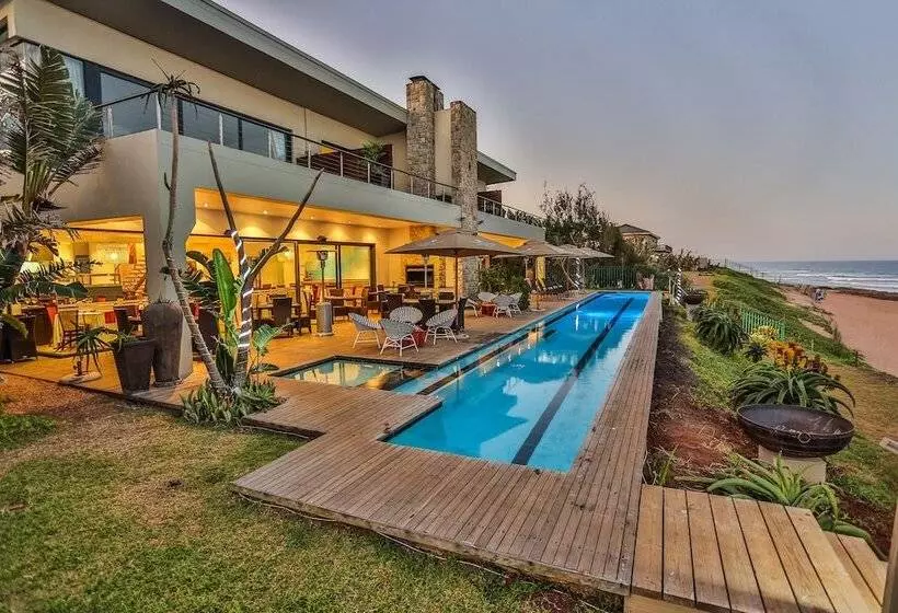 Отель Canelands Beach Club