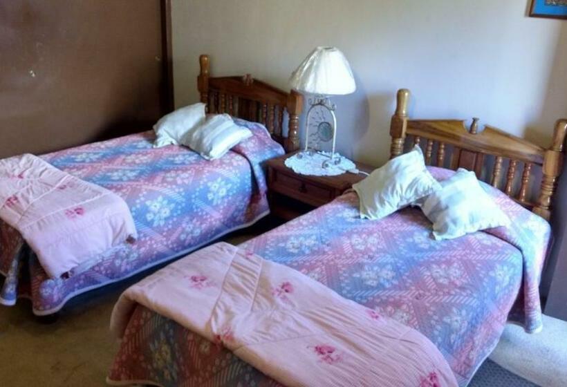 پانسیون Casa Num 11   Arquitectos