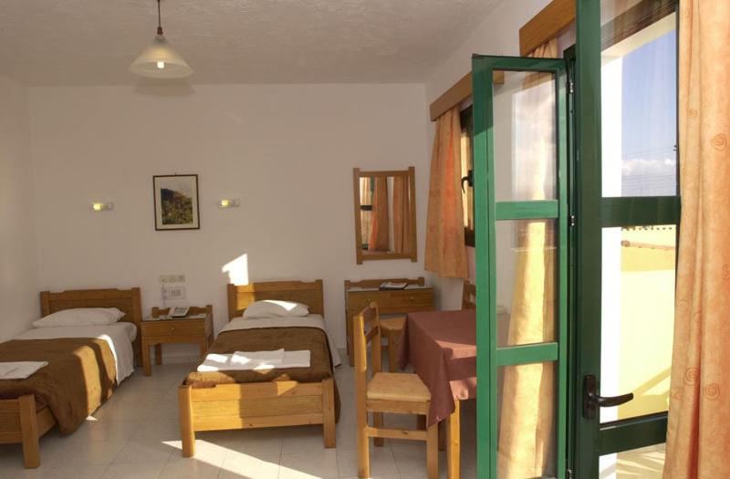 ホテル Sunrise Apartments Koutouloufari